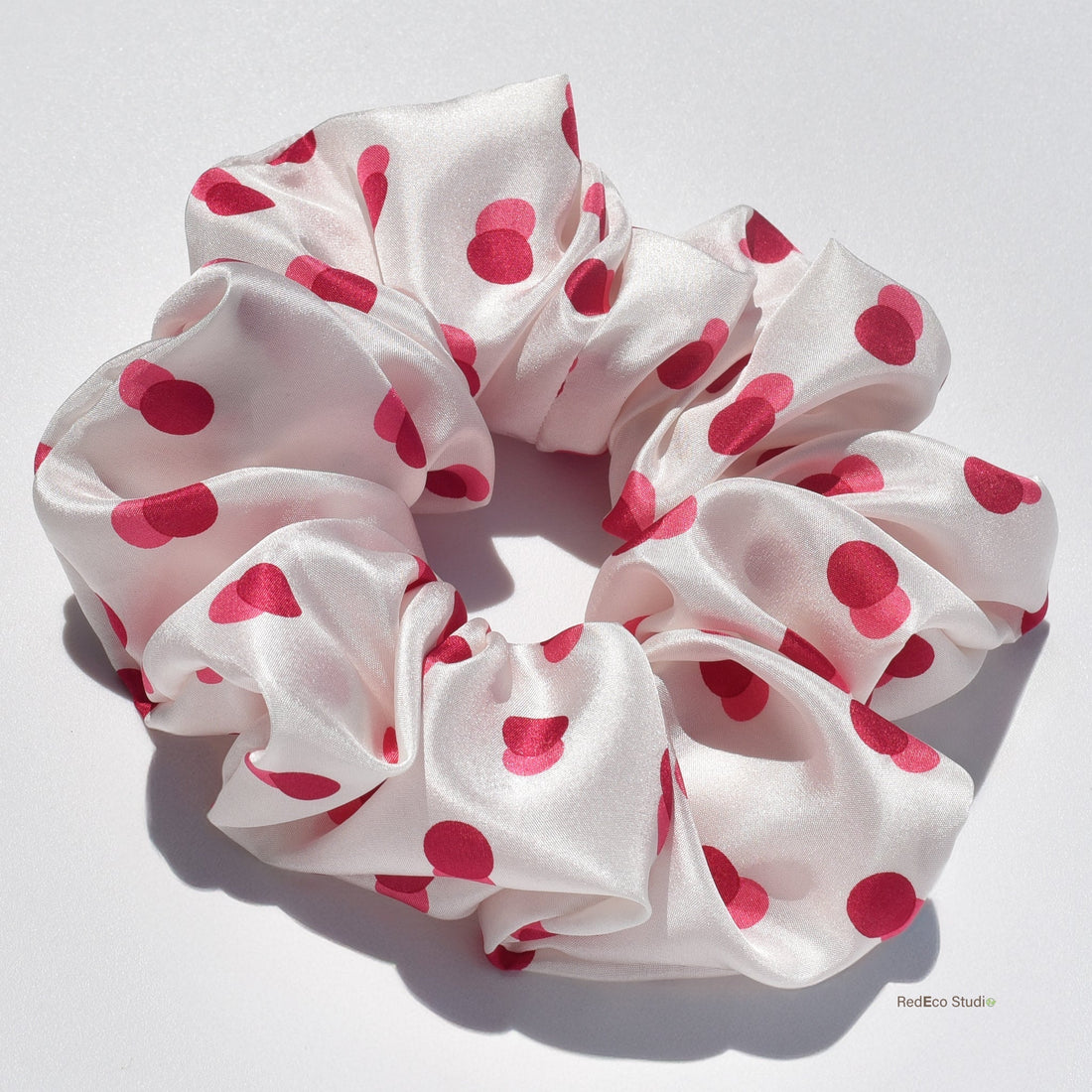 RedEco Studio oversized silk scrunchie in pink and red spots — made from deadstock fabric
