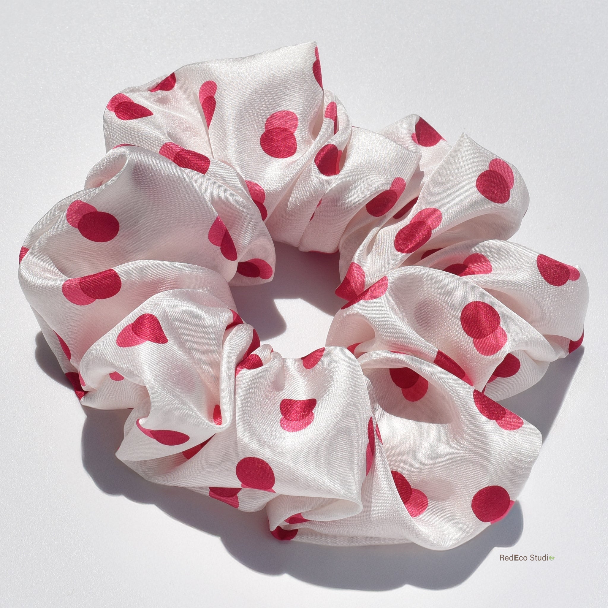 RedEco Studio oversized silk scrunchie in pink and red spots — made from deadstock fabric