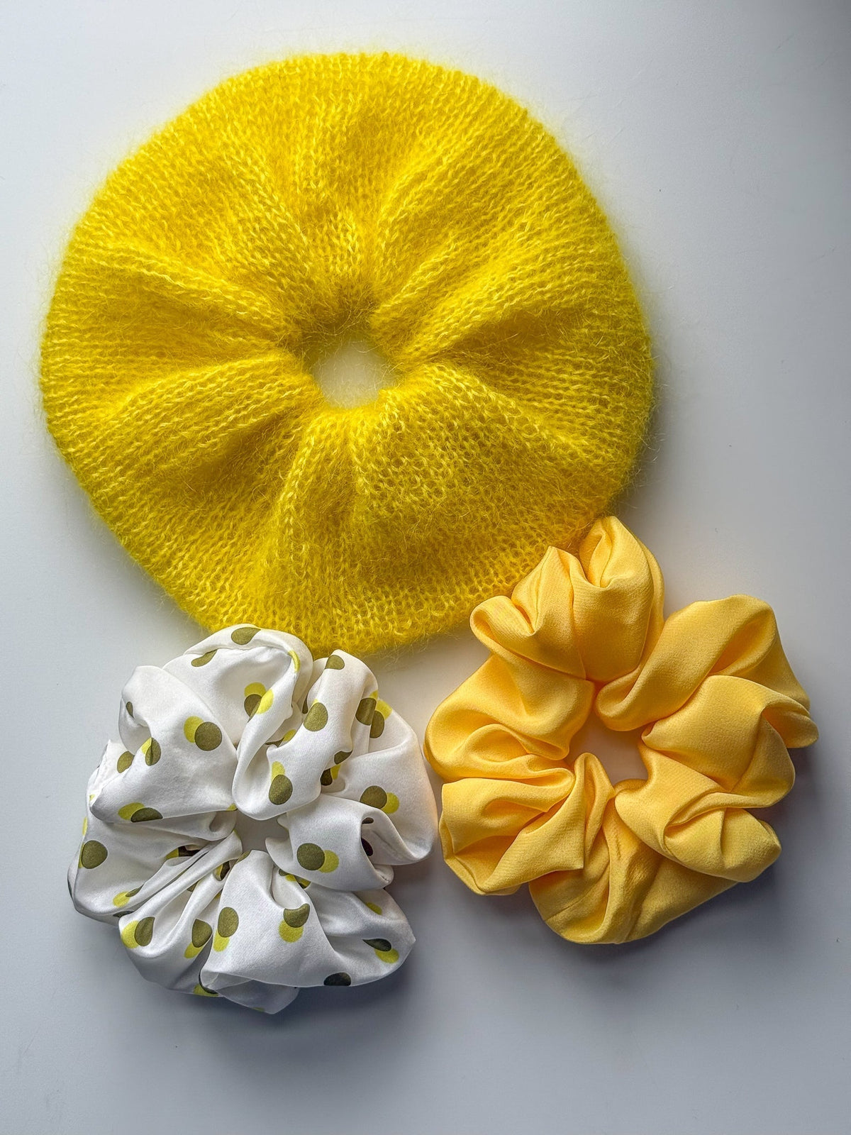 Yellow mohair silk scrunchie beside yellow and white printed pure silk scrunchies | Handmade in Australia 