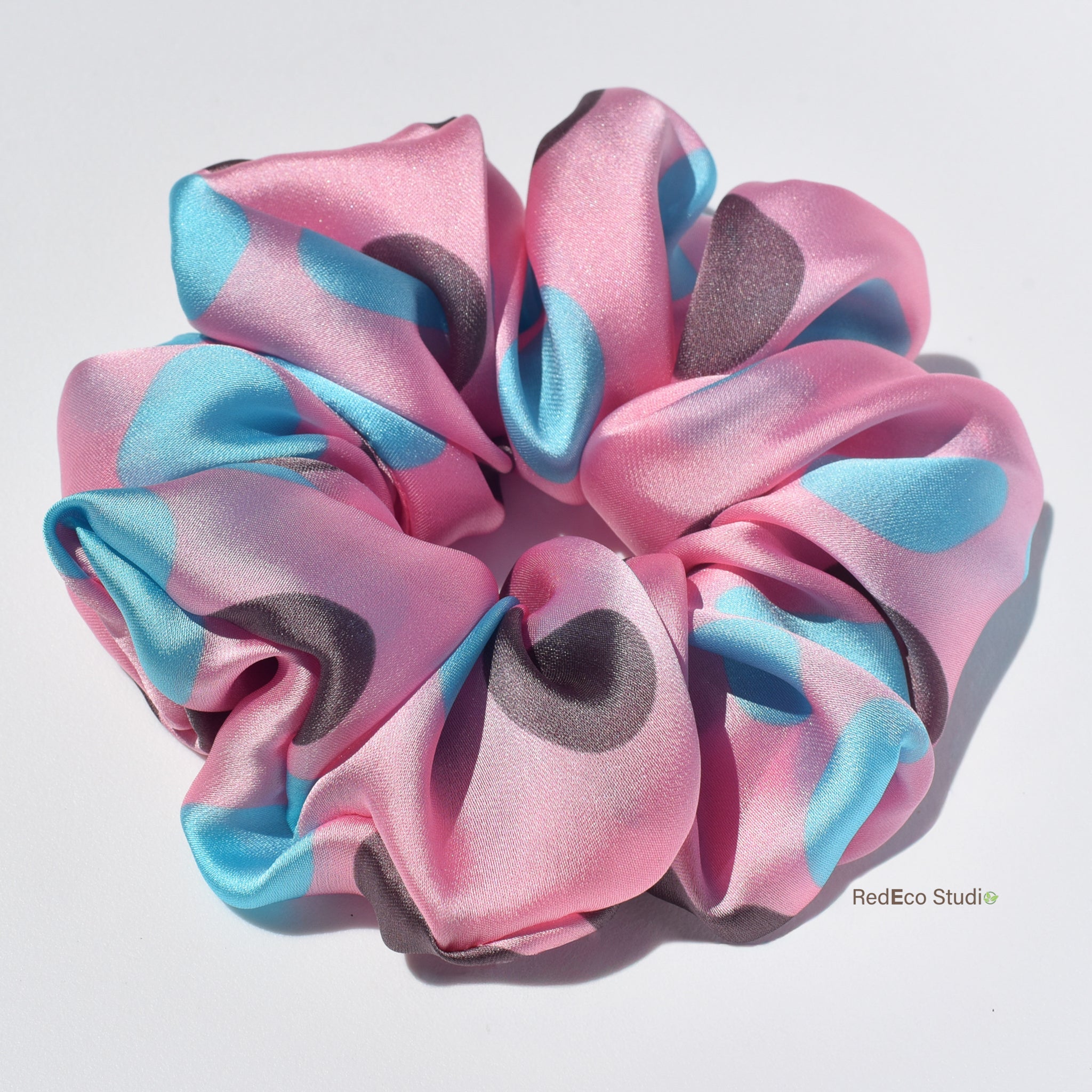 Large silk satin scrunchie on a light background