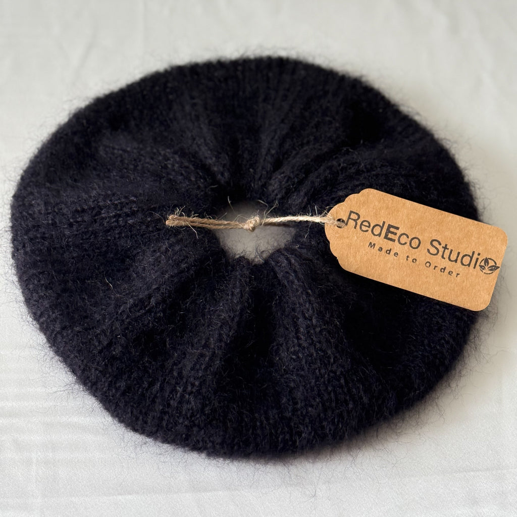 Black scrunchie with a 'RedEco Studio' tag on a white background