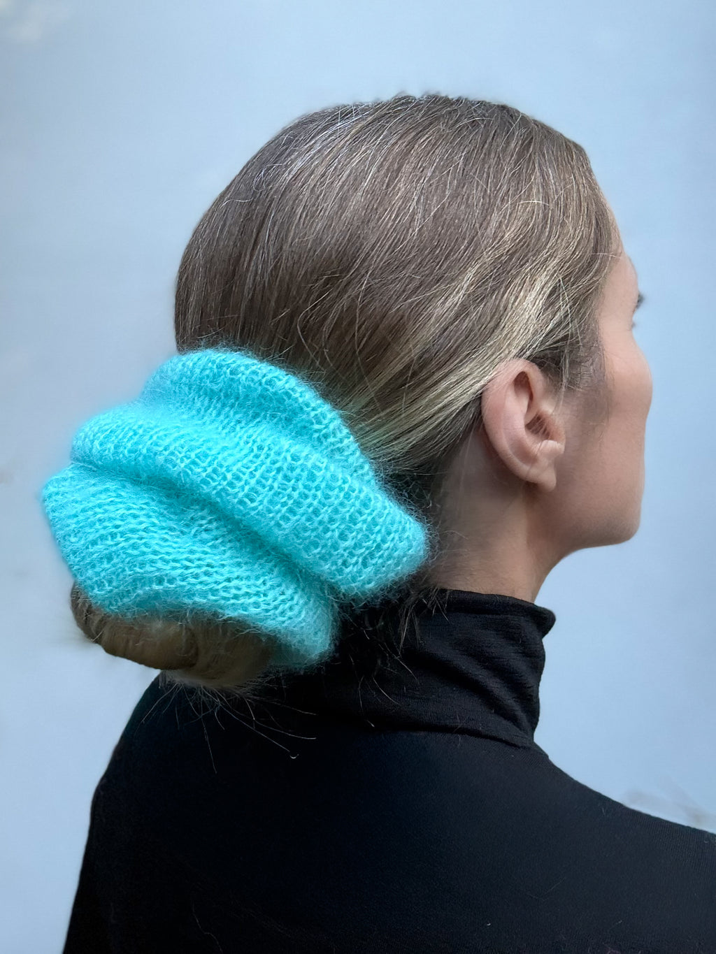 Oversized XL hand knitted silk mohair scrunchie in bright blue worn in bun — handmade in Australia | RedEco Studio