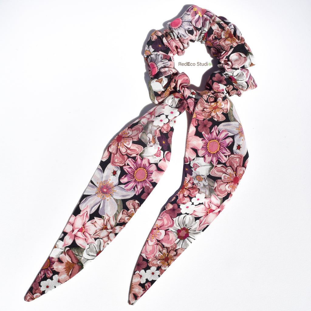 Large Floral silk scrunchie with pink and white flowers and long tails on a white background