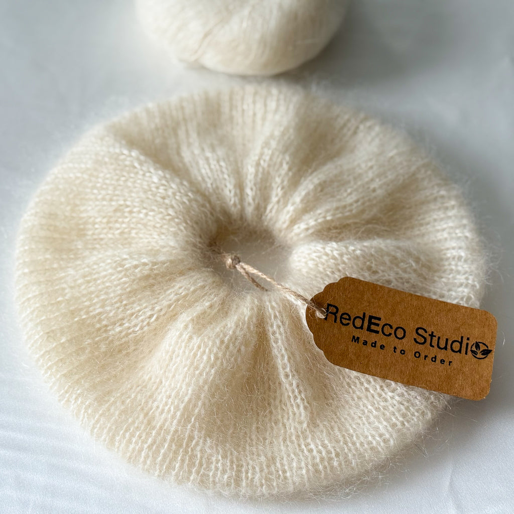 Beige scrunchie with a 'RedEco Studio' tag on a white background
