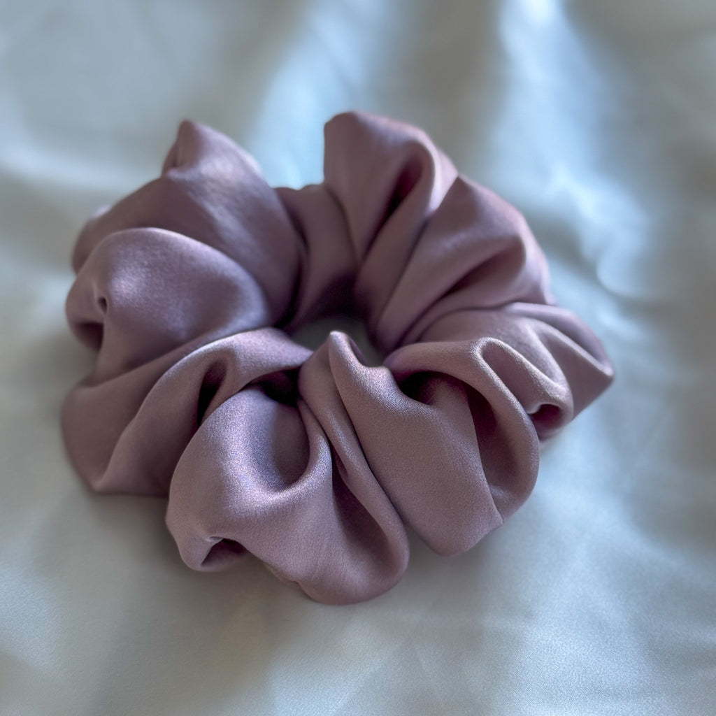 Pink scrunchie on a light background
