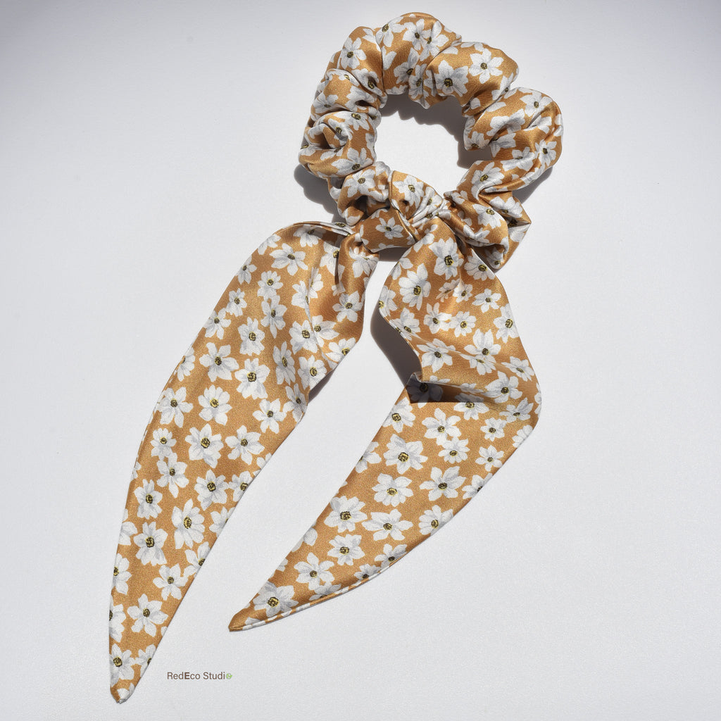 Floral premium silk scrunchie with long tails on a white background