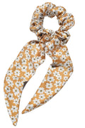 Regular sized floral silk scrunchie with long tails on a white background