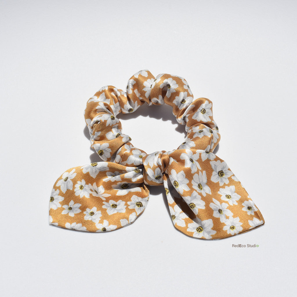 Mini floral premium silk scrunchie with bow on a white background