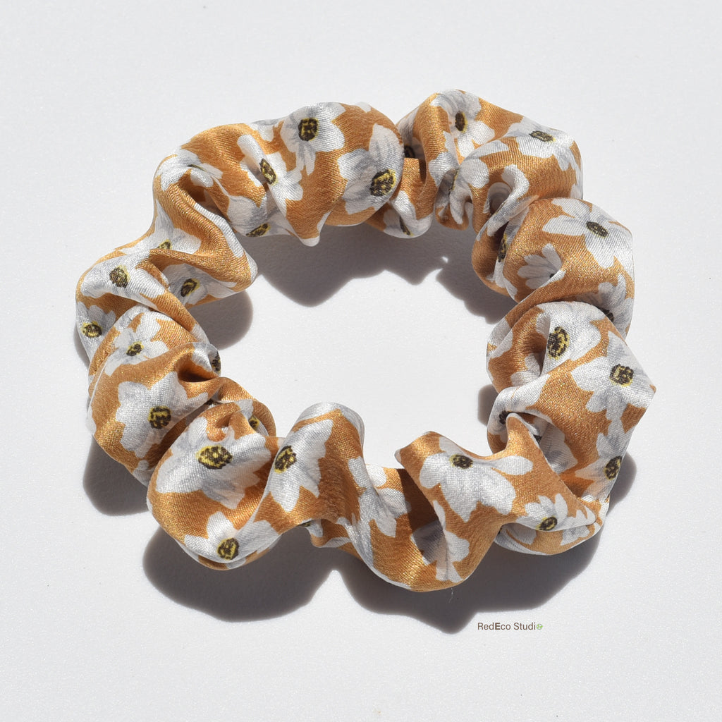 Mini floral patterned premium silk scrunchie on a white background