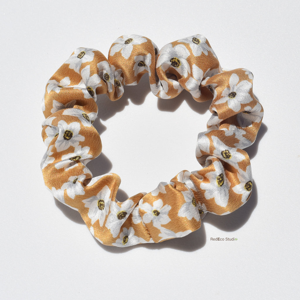 Mini floral patterned premium silk scrunchie on a white background