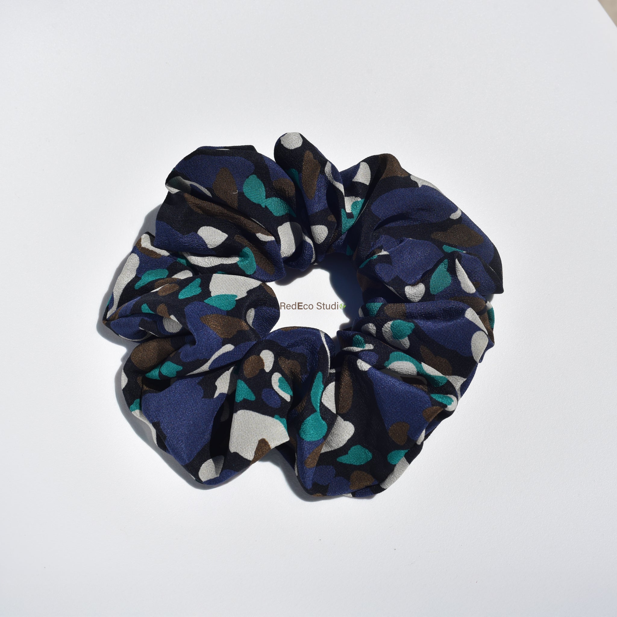 Oversized 100% Silk Scrunchie - Multicolour abstract pattern on a navy blue base