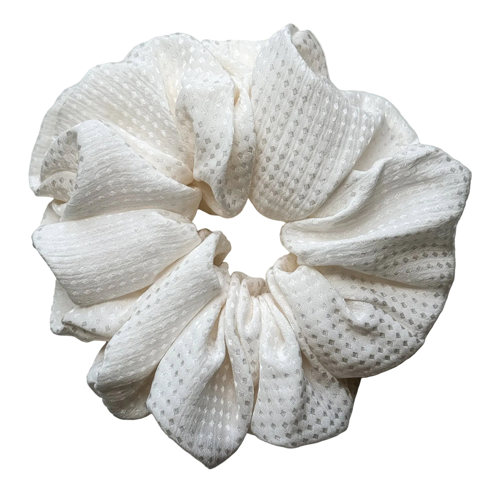 RedEco Studio oversized silk scrunchie in high-luster ivory cream, flat lay top view.