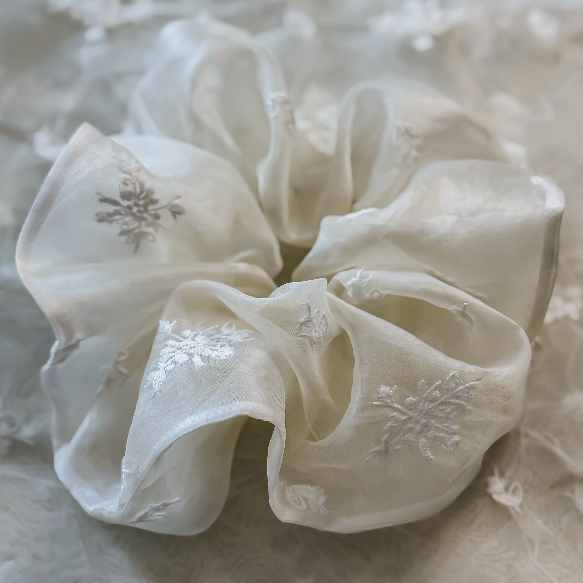 close up of white organza scrunchie