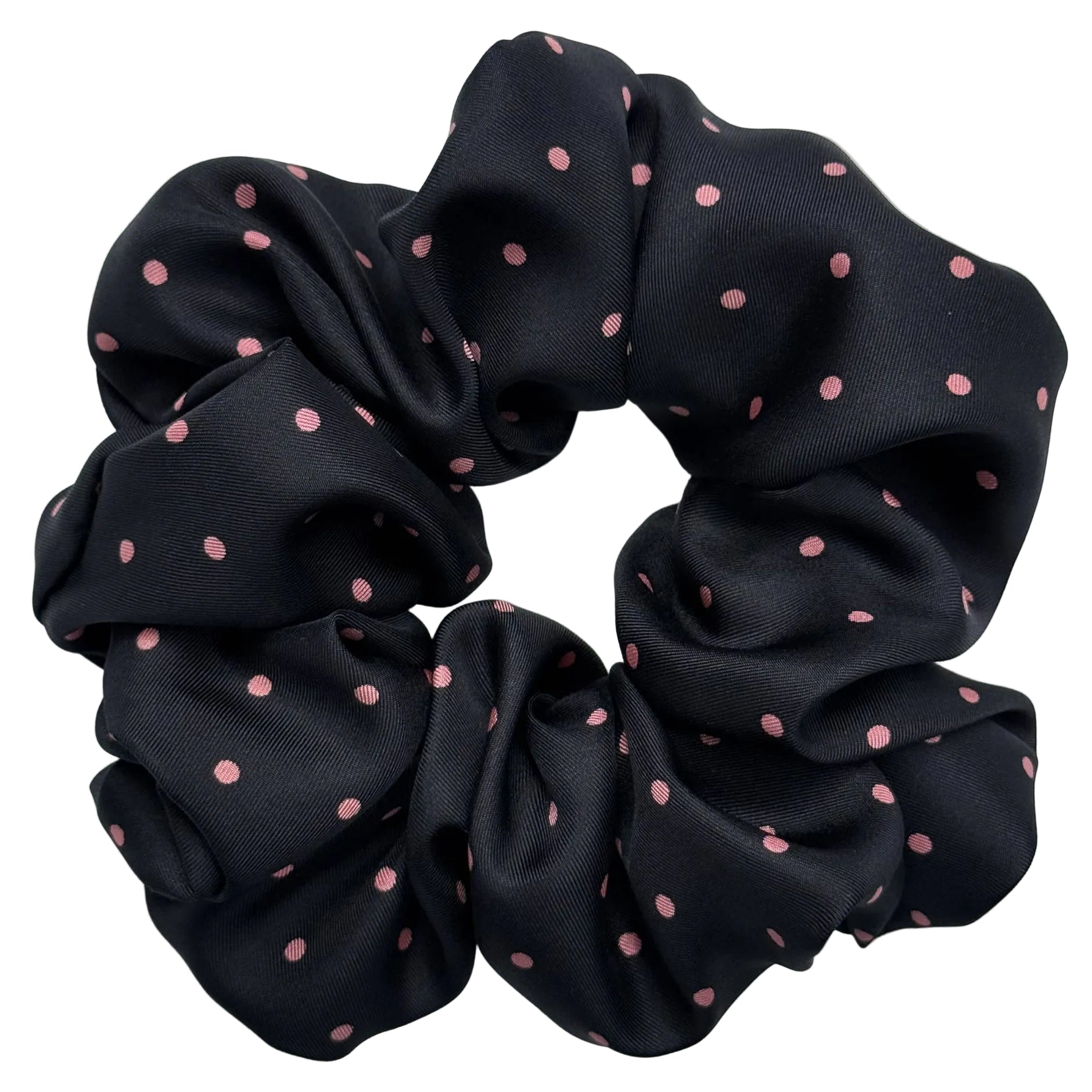 Black scrunchie with pink polka dots on a white background