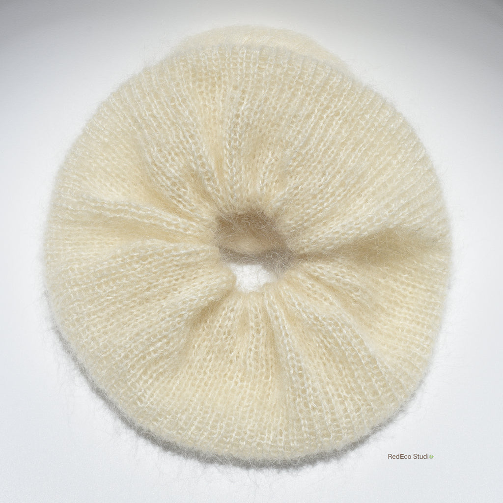 Cream xl hand knitted scrunchie on a white background