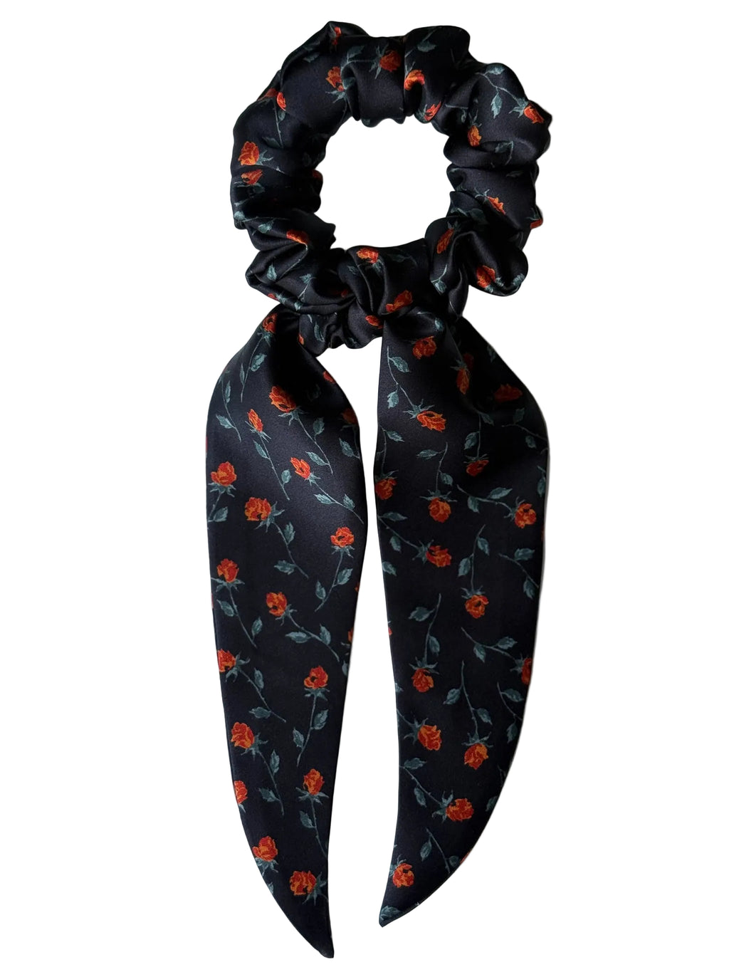 Ember Rose classic silk scarf scrunchie with long detachable tails, flat lay showing orange rosebuds and sage leaves on black