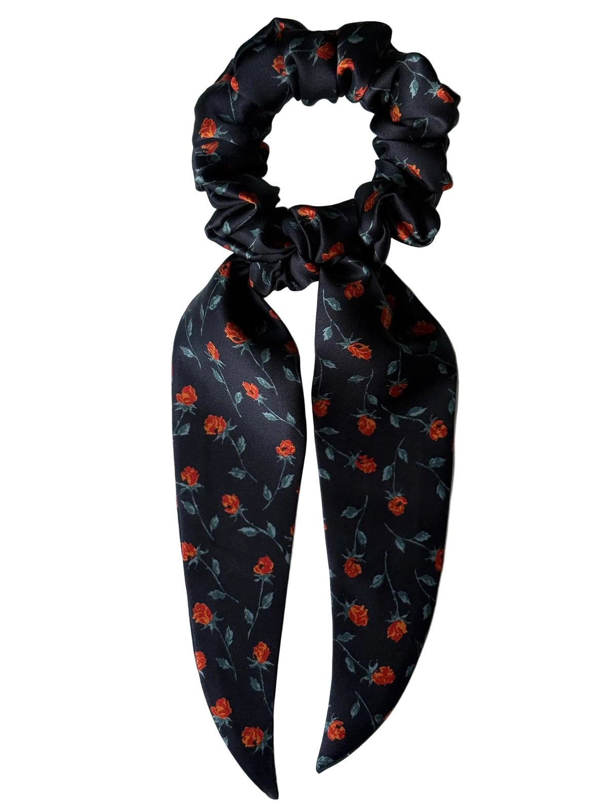 Ember Rose classic silk scarf scrunchie with long detachable tails, flat lay showing orange rosebuds and sage leaves on black