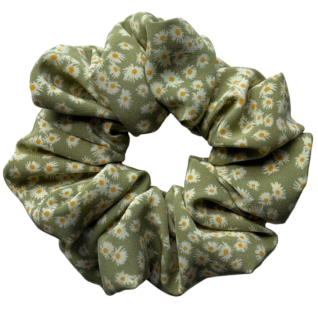 Matcha Daisy oversized silk crêpe de chine scrunchie, flat lay top view showing tiny cream and yellow daisies on sage green