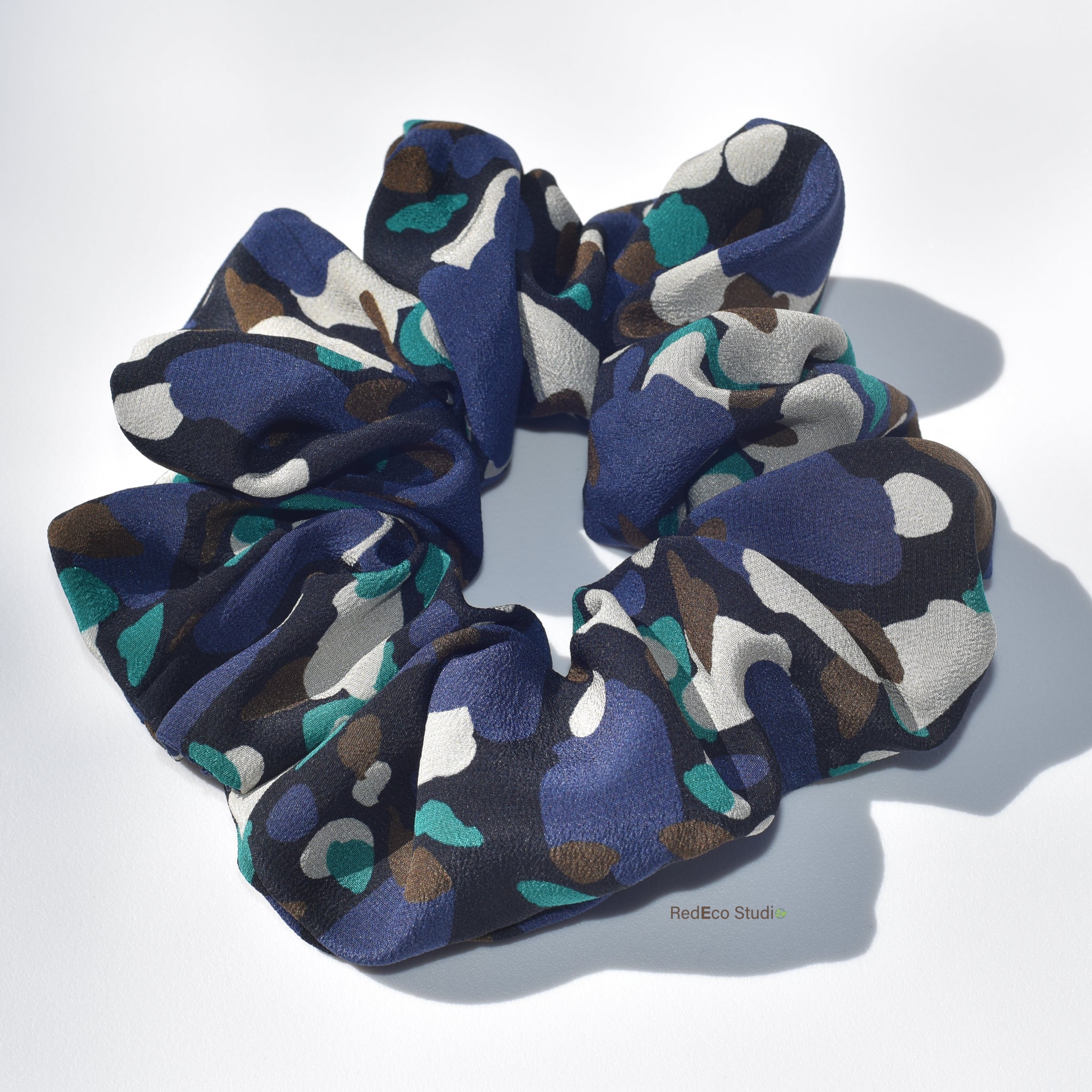 Multicolored scrunchie on a white background