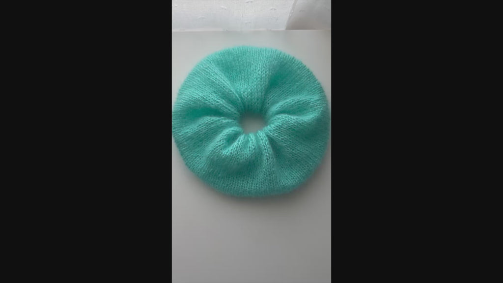 close-up video of texture of mohair silk knitted scrunchie
